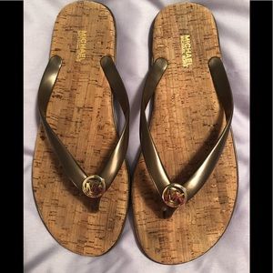 Michael Kors bronze Jet Set flip flops